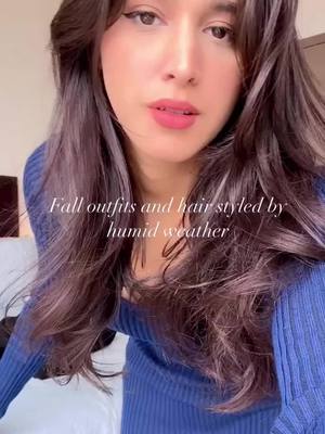 A post by @divyaaaa_97 on TikTok caption: My hair tends to go full frizz mode every fall, but @satinstrandshaircare hair oil keeps it smooth and manageable. With a blend of seven nourishing ingredients, it’s my go-to frizz fighter this season! #hairfrizz #frizzyhair #fallhair #satinstrandshairoil #falloutfit #frizzcontrol #hairstyles #fallfashion #overcoat #knitdress 