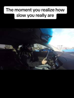 A post by @grannatl86_ on TikTok caption: #creatorsearchinsights i was on a personal best pass and got back halfed by 20 mph 🤣 #closedcourse #professionaldriver #notdangerousacts #fyp #carsoftiktok #cartok 