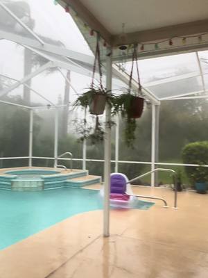 A post by @marchbaby217 on TikTok caption: Some wind before #hurricanemilton the screens were all torn off after it made landfall #hurricanehelene ripped all the solar panels off of the roof . Lots & lots of damage from back to back #hurricanes #praying for #florida #blessed to have a hime still 