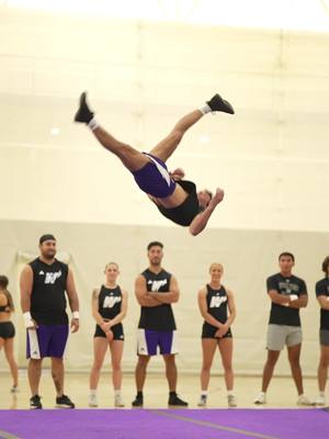 A post by @jordanharrington__ on TikTok caption: random warm up clinic combo 💜#weberstate #cheer #fyp #tumbling 