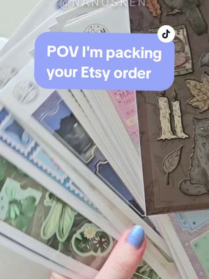 A post by @nanosken on TikTok caption: Haven't made an order packing video in a while! 💛 #scrapbooking #stationeryshop #etsyshop #SmallBusiness #stickershop #junkjournal #scrapbooksupplies #foryou #pov #orderpacking #packyourorder 