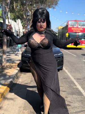 A post by @appleadayxo on TikTok caption: How’s my head? So many complaints #elvira #ladragqueen #halloween 