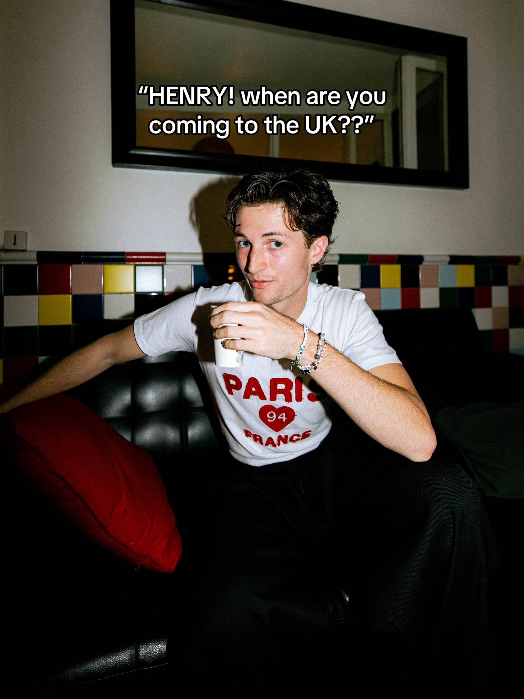 A post by @henrymoodie on TikTok caption: UK 🇬🇧 WHO’S READY TO SCREAM DRUNK TEXT WITH ME🤩🤩 see you THIS WEEK!! @James McVey from the vamps will be joining me and ben on stage for these shows i am SO EXCITED #fyp #singer #singing #henrymoodie #thevamps 