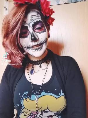 A post by @littlemoongirl19 on TikTok caption: #halloweenmakeup #makeup #crazy #emo #style #germany 