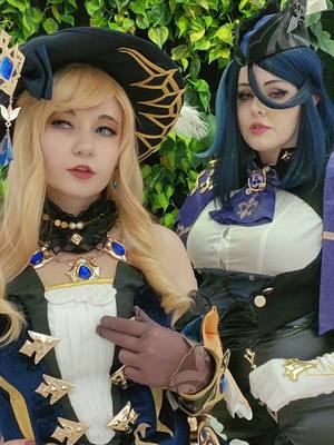 A post by @yelepiere on TikTok caption: @🌟💜Tatachuu💜🌟 #navia #clorinde #naviacosplay #clorindecosplay #GenshinImpact #genshinimpactcosplay 