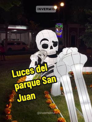 A post by @invermidmx on TikTok caption: 🌟💀 ¡La magia del Día de Muertos te espera en el parque de San Juan! 💀🌟 Festival de luces que rinde homenaje a nuestros seres queridos. Ven a vivir esta experiencia única. Disfruta de un ambiente lleno de color, música y alegría, donde cada paso te conectará con nuestras raíces. ¡Te esperamos para celebrar la vida! 🎉🌈 #somostradicion #festivaldelasanimas #paseodelasanimas #diademuertos #hanalpixan #janalpixan #foryoupage #fyp #fy #parati #yucatan 