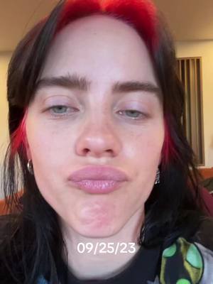 A post by @billieeilish on TikTok caption: i took this video a year ago, right after recording these adlibs/descants in wildflower because i was so obsessed with them hahaaa and i genuinely thought no one would care about them or this song at all!!! man… just been making me feel so good seeing all the love for this song and specifically these adlibs gosh i just love you. 