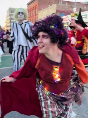 A post by @belladivaworlddance on TikTok caption: Our Mary Sanderson! #broadwayhalloweenparade #denverhalloweenparade #hocuspocus #marysanderson #belladivaworlddance 