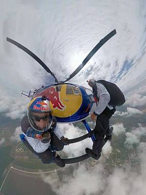 A post by @seanmaccormac on TikTok caption: At work daydreaming about flying on the edge of a cloud @Red Bull Air Force @Red Bull #redbullgivesyouwings 