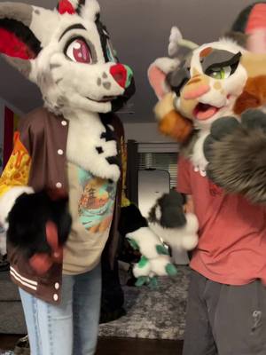 A post by @cindycatcalico on TikTok caption: I love you @Leo <3 #furry #furryfandom #furries #fursuiting #fursuiter #fursuitdance #fursuiter 