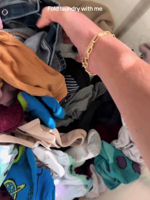 A post by @madisonmayfieldd on TikTok caption: Thanks for watching me do the chore i hate the most #laundry #laundrytok #laundryday #foldingclothes #fypシ 