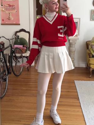 A post by @hannahruthzander on TikTok caption: My favorite easy go to halloween costume 📣🎀👻♥️✨ #halloweencostume #vintage #cheerleader #diyhalloween 