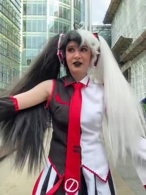 A post by @solarbubblestv on TikTok caption: Guys I NEED to come up with a new concept but idk what ahhh #cosplay #miku #monokumamiku #danganronpa #hatsunemiku #solarbubbles