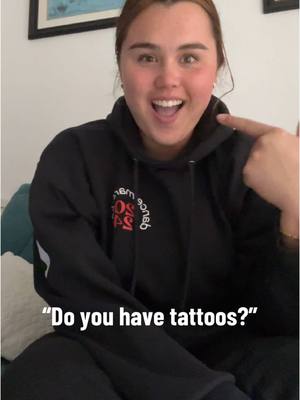 A post by @maliapreisendorf on TikTok caption: What even is my tattoo? Barcode or spotify song code? The world may never know