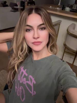 A post by @chrishell.stause on TikTok caption: Meow 🐱 #FYP #NewMusic #NewMusicFriday #foryourpage #foryourears 