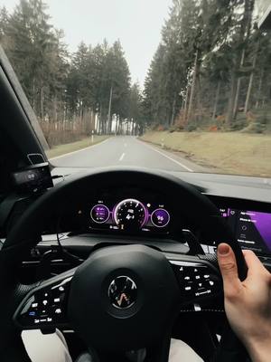 A post by @blvck_mk8r on TikTok caption: Escape 🌲 #car #carsoftiktok #golf8r #fullblack #vw 