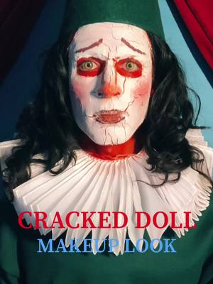 A post by @ashurgharavi on TikTok caption: Cracked doll makeup trend! Inspired by @FAYA #makeup #halloween #clown #crackeddoll #doll #fyp 