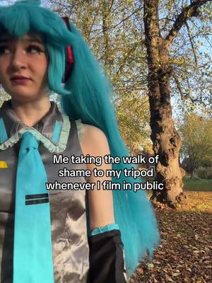 A post by @solarbubblestv on TikTok caption: Someone thought it was a microphone and asked me to sing 💀 #cosplay #hatsunemikucosplay #vocaloid #hatsunemiku #miku #solarbubbles