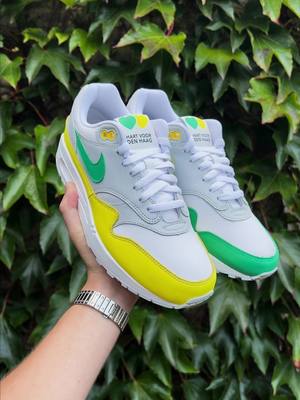 A post by @sebastiaan.vl on TikTok caption: Wie van jouw vrienden moet deze “ADO” customs hebben? 💚💛 #sebastiaan #customshoes #ado #sneakers #denhaag 