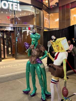 A post by @gottmik on TikTok caption: Spongebob and squidward serving it up bikini bottom stye 🧽🍍🦑📸#halloween #heidiklumhalloween #spongebob @Violet Chachki 