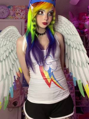 A post by @pinkam3na on TikTok caption: I LOVEE the Funko mlp vinyls sm #mlp #rainbowdash #mlpcosplay #rainbowdashcosplay #mylittlepony 