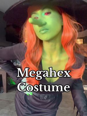 A post by @avalonmonet on TikTok caption: Last minute Megg. You can see my little Mogg in the background #megahex #simonhanselmann #meggmoggandowl #cosplay #comiccosplay  