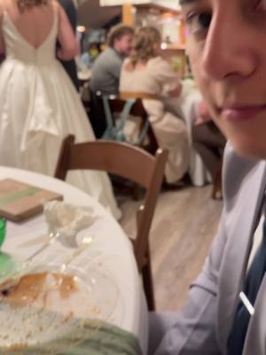 A post by @trinitrippy on TikTok caption: Cant take him anywhere this time of year, I was watching too though ngl 🫣 #sisterswedding #wedding #footballtiktok #fantasy #fyp @Julio Lanuza 