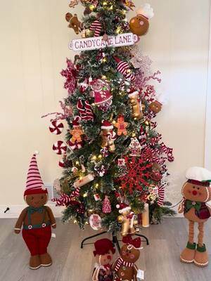 A post by @lacraftylatinaco on TikTok caption: Santa’s coming to town!!! It’s the most wonderful time of the year! 🌲❤️  #ChristmasSeason #gingerbreadchristmasdecorations #gingerbreadhouse #gingerbreadtheme #gingerbreadtree #christmasdecor #hobbylobbychristmas #athomestores #christmastree #christmastreedecorating 