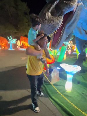 A post by @vernicalisbetharg on TikTok caption: #dinosaur #toddlersoftiktok #toddleradventures #nike #luminocityfestival #viralvideo #longisland @LuminoCity Festival 