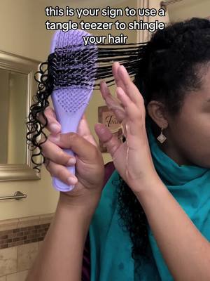 A post by @lauryypoo on TikTok caption: i cant believe i just thought of this #CapCut #naturalhair #curlyhair #type4hair #type3hair #tangleteezer 