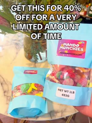 A post by @mando.munchies on TikTok caption: we have a special on MANDOMUNCHIES. COM 🚨ITS BUY 2 GET 1 🆓⏳🍬 