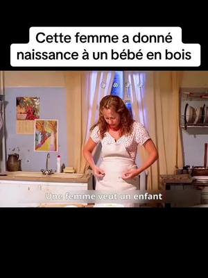 A post by @wangrnybmfp on TikTok caption: Cette femme a donné naissance à un bébé en bois.#movie #film #foryou 