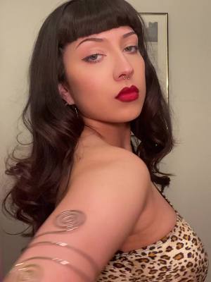 A post by @neoncowboy on TikTok caption: The notorious Bettie Page for Halloween 🐆