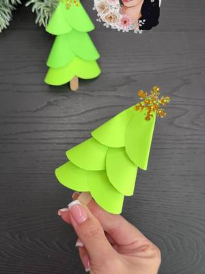 A post by @viki.studio.origami on TikTok caption: Easy Paper Christmas Tree DIY Christmas Decorations #christmas #christmastiktok #christmasdecor #christmastrees #easycrafts #papercrafts #craft #DIY #christmastree #christmas2024 