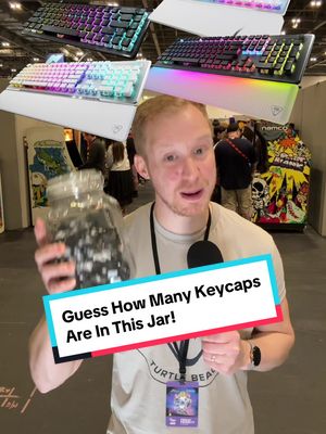 A post by @turtlebeach.pc on TikTok caption: Guess how many keycaps are in this jar and you could win a Vulcan II TKL Pro gaming keyboard #keyboard #gaming #pcgaming #pcgamer @Chris Trout @Turtle Beach @TurtleBeachGames 