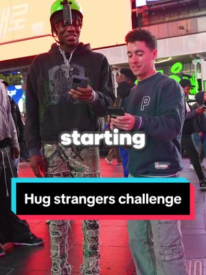 A post by @ericsuerez on TikTok caption: Would you hug strangers in Times Square for money? 🤔💰#manonthestreet #streetinterview 