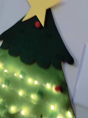 A post by @ on TikTok caption: BEST BUY EVER!!!!!!! #feltchristmastree #christmas #holiday 