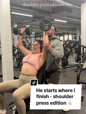 A post by @paigecosgrovex on TikTok caption: He starts where i stop but shoulder press edition.  Its been a while since we’ve done dumbbell shoulder press and wanted to see what we could still lift. 💪🏻 #fyp #foryou #viral #foryoupage #newcastle #gym #GymTok #gymmotivation #shoulderpress #workout #motivation #progress 