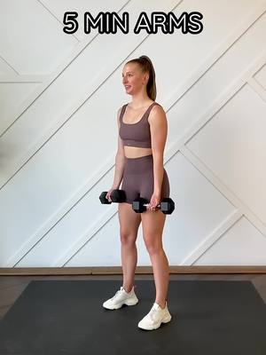 A post by @pixelstories2024 on TikTok caption: A super quick and effective 5 minute arm workout using dumbbells/weights! The full, follow along, workout can be found on her channel. @MadFit on yt, follow her #homeworkout #fitness #viralvideo #fyp