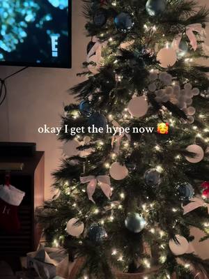 A post by @alyssaopperman on TikTok caption: add the bows!!!!! #christmasdecor #xmas #bows #christmastiktok #christmastree 