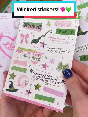 A post by @kiacreates on TikTok caption: new Wicked inspired stickers! 💚💖 #wicked #wickedthemusical #stickers #stickersheets #journalstickers #plannerstickers #glinda #elphaba #defyinggravity #pinkgoesgoodwithgreen #wickedmovie #wickedwitch 