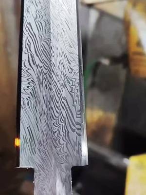 A post by @leodeyousword on TikTok caption: Do you like?🥰#fyp #foryou #swordartonline #knife #knifemaking #swordsq #knifeskills #forging #blacksmith #handicrafts #swordtiktok #vikingsword #customerservice #swordsman #damascus #katana #swordfish #vikingswordtattoo #forg 