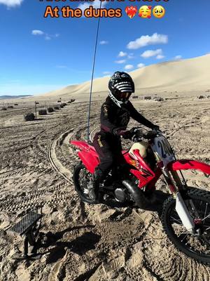 A post by @jodirt32 on TikTok caption: First time on the hubby’s CR500 at the dunes 🥰❤️‍🔥 #cr500 #sanddunes #sandmountain #dirtbike #sandbike #honda #5hundy #500 #hondagang #fasthouse 