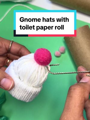 A post by @monicacraftsitall on TikTok caption: The best part, these are cheap to make. I got this yarn during a sale. Gnome hat ornaments with toilet paper roll. #christmascrafts #ornaments #diyornaments 