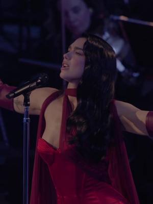 A post by @dualipaofficial on TikTok caption: ITS OFFICIAL, LIVE FROM THE ROYAL ALBERT HALL, THE ALBUM, 6 DECEMBER ❤️❤️❤️ hearing my songs and performing them in this form for the first time was the most special experience, and now they're yours, pre-order now !!! @itv broadcast will be live 8th December and @CBS on 15th December for the full experienceeee