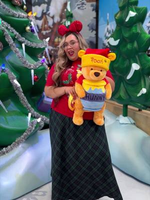 A post by @jayyluvsthis on TikTok caption: Okay how perfect is my santa Pooh santa hat on the Plush Backpack?!  I was so obsessed ! #disneyparks #winniethepooh #disneyholidays #disneystyle #disneyoitfitoftheday #disneyootd #disneyootdinspo 