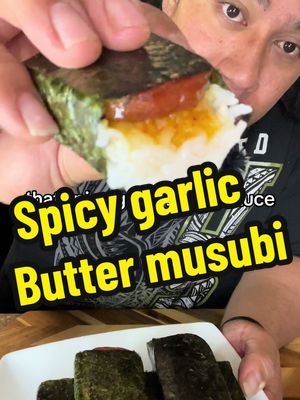 A post by @samoanfoodsurfer on TikTok caption: Did you know that Hawaii 7-11s sell spicy garlic butter spam musubi? Missed them so bad i came up with my own recipe. #tiktokfood #foodies #spammusubi #musubi #spam #samoa #samoan #Recipe #howto 