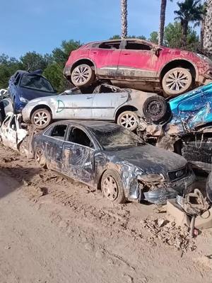 A post by @matrix20.30 on TikTok caption: Vehiculos destrozados por la DANA 23 días después 