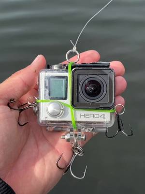 A post by @kickintheirbasstv on TikTok caption: Remember fishing with a GoPro?! 🐟🎥 #fish #fishing #gopro #fishinglure #goprofishinglure #fyp #fishingvideos #kickintheirbasstv 