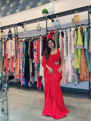 A post by @priyal814 on TikTok caption: Make a statement in this stunning RED PRE-DRAPED SAREE! This beautiful saree is designed to make you feel confident and glamorous. The vibrant red color is perfect for any occasion, from weddings to parties to formal events. Sizes available  #redsaree #priyalscollection #designer #weddingwear #receptionwear #trending #facny #saree #readytowear #fyp 